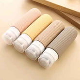 4PCS Silicone Travel Bottles Set – Refillable Portioning Bottles for Lotion & Body Wash